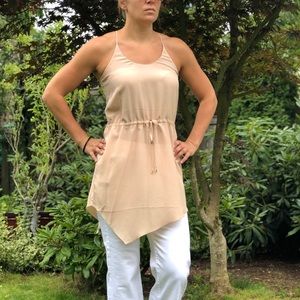 A symmetrical drawstring tunic